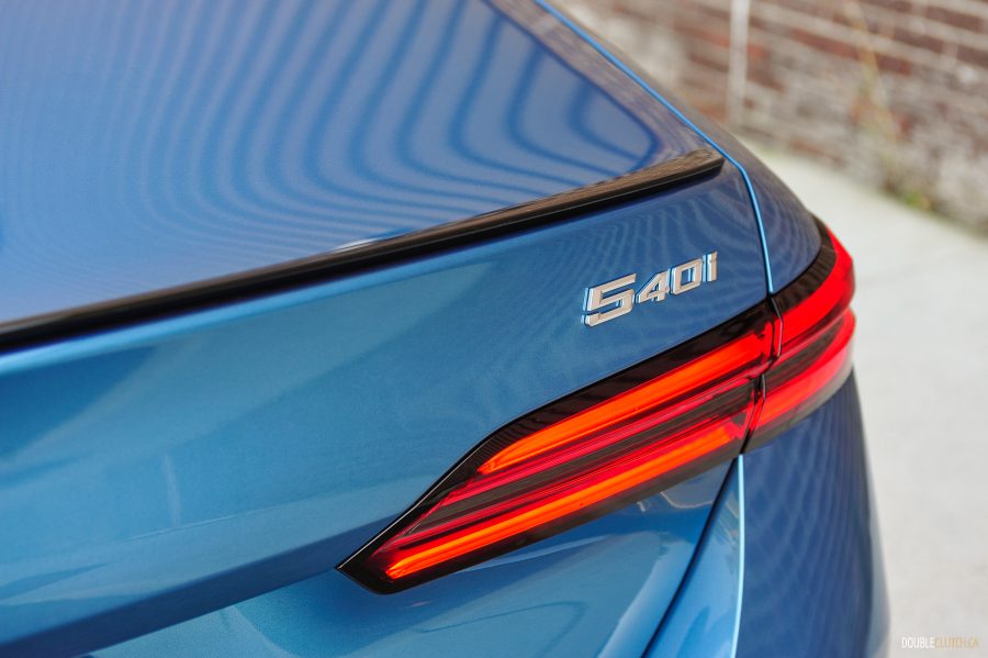 2025 BMW 540i Legacy Edition in Maldives Blue close up model badge