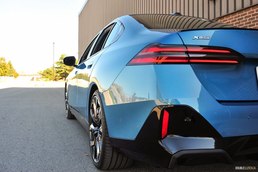 2025 BMW 540i Legacy Edition in Maldives Blue close up rear