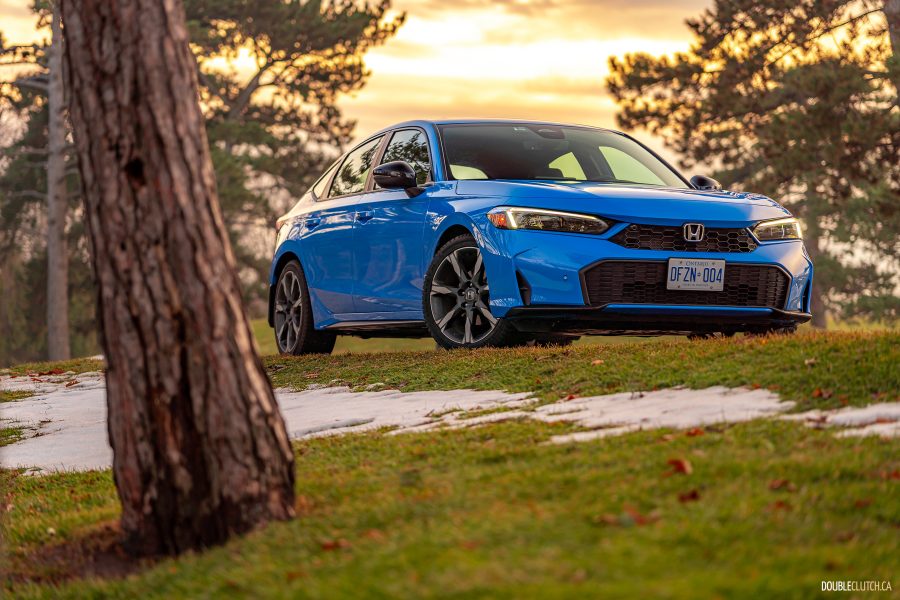2026 Honda Civic Hatchback Hybrid in Boost Blue